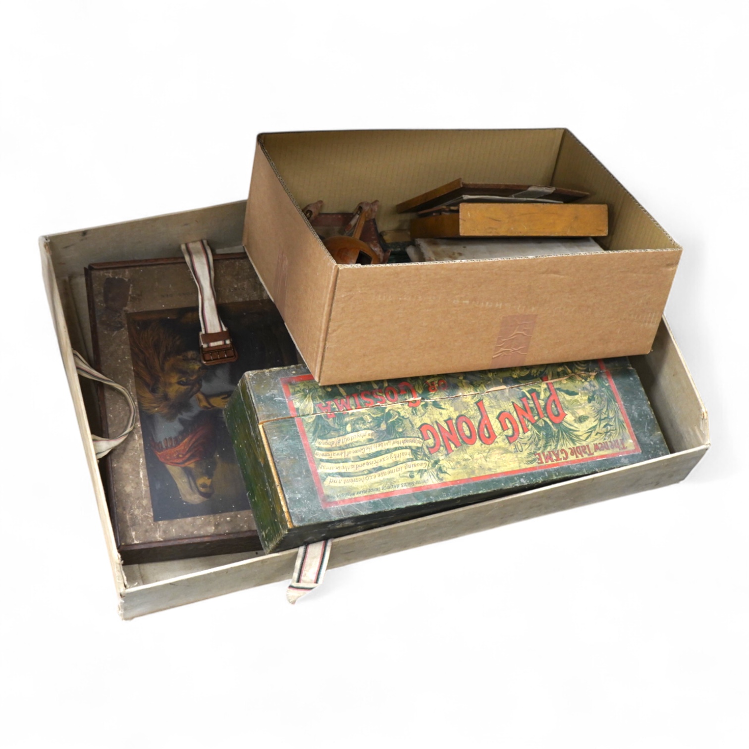 A collection of 19th century toys including; an early Jaques Ping Pong or Gossima set in an illustrated wooden case, a Crandall’s John Gilpin wooden horse with folded linen backed poster, ‘The Adventures of John Gilpin’